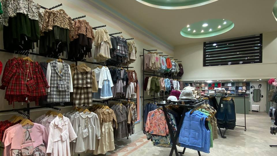 پوشاک کودک ونوجوان هومان