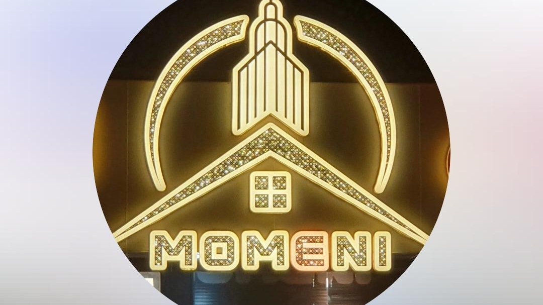 املاک مومنی